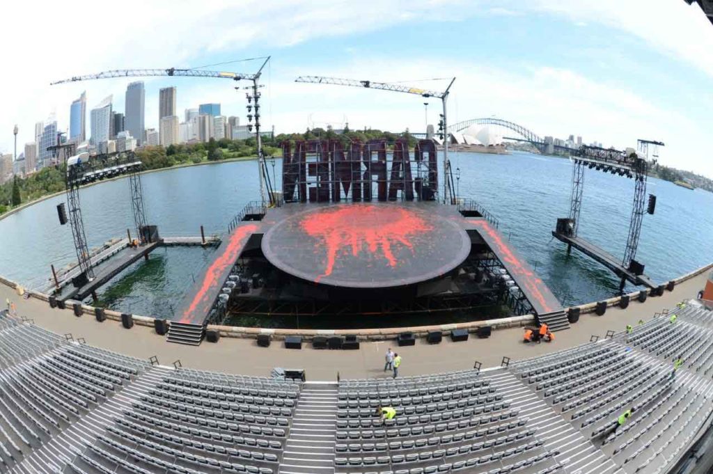 Grandstand seating and staging overlooking Sydney Harbour Bridge